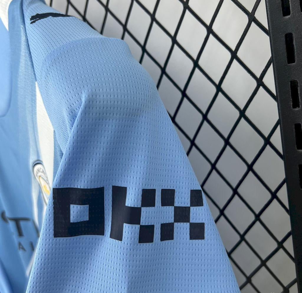 CAMISOLA MANCHESTER CITY I 2526 - MULHER