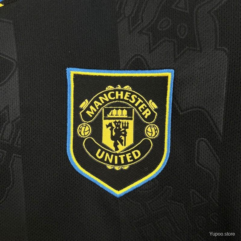 CAMISOLA MANCHESTER UNITED III 25/26 - MULHER